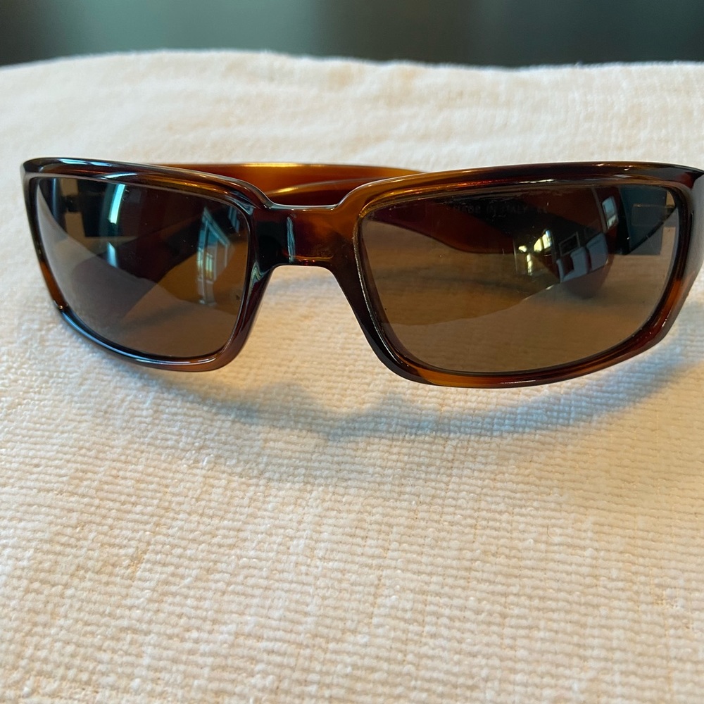 Brown Calvin Klein 842S sunglasses like new silver logo